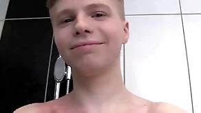Cute soapy boy unassisted respecting a shower
