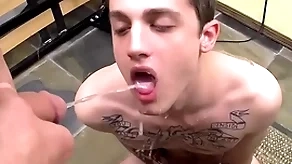 Tattooed twink chris porter fucked and peed insusceptible to in gay group