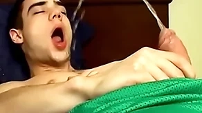 Adorable jock zack randall pees together with cums on his smooth throng