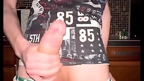 Twink pulls off his panties and jerks off his jumbo 23 cm cock
